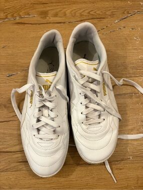Puma Women’s White Sneakers with Gold Accents